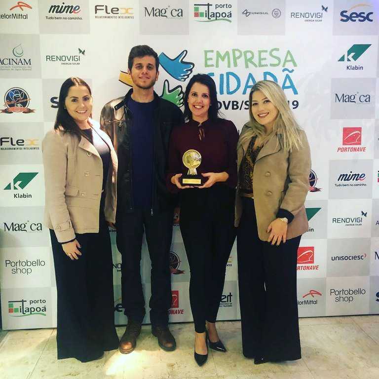 Representantes da Portobello Shop recebem o Prêmio Empresa Cidadã 2019 com o case Coral Anjos Luz