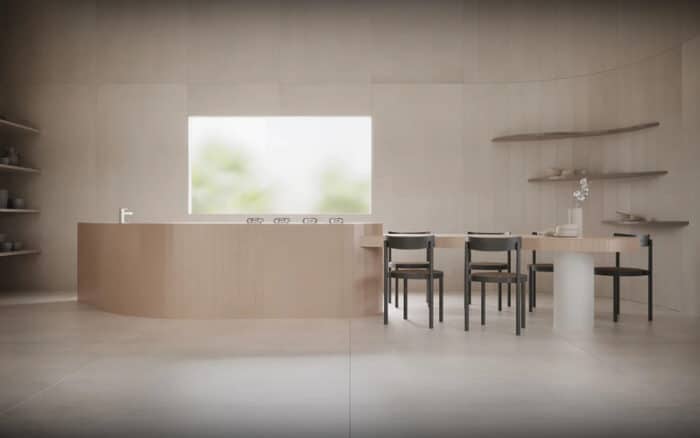Bancada de cozinha integrada com mesa e cadeira para refeições, ambiente amplo com prateleiras suspensas para utensílios 