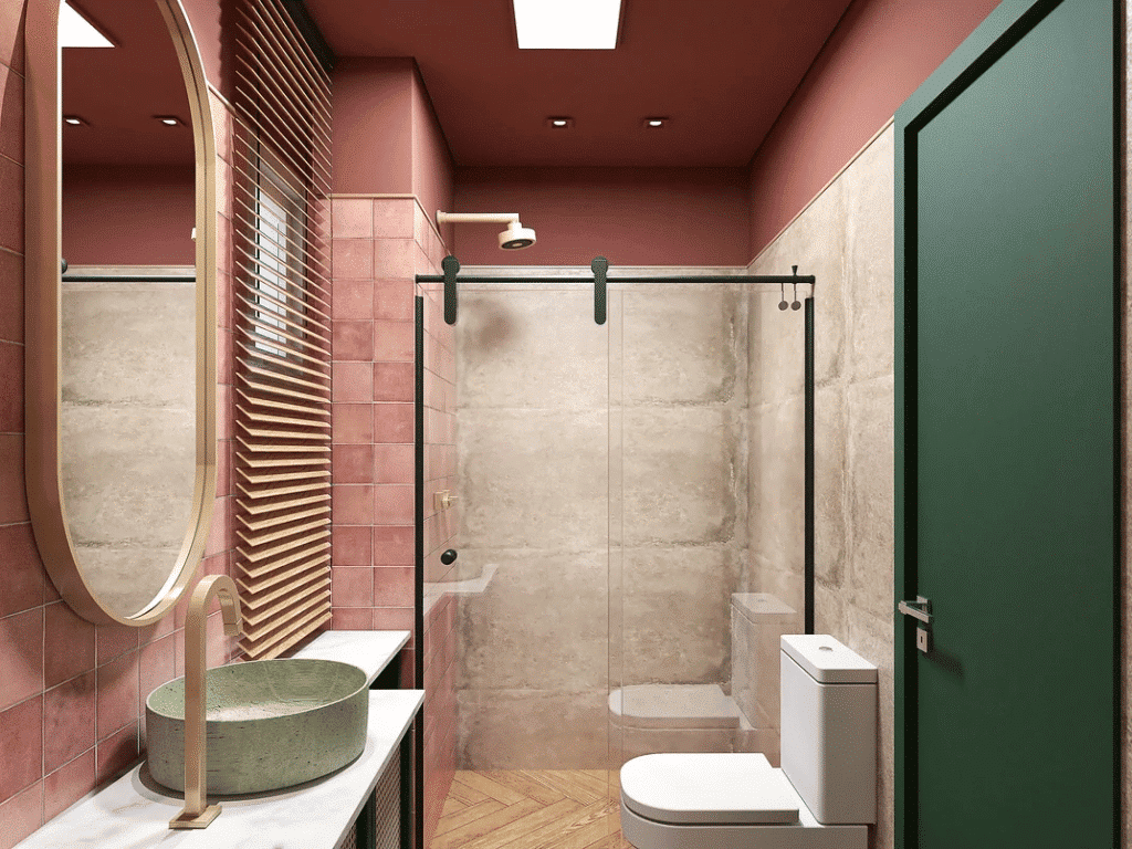 Banheiro colorido, com box preto minimalista, parede em vermelho e revestimento cinza