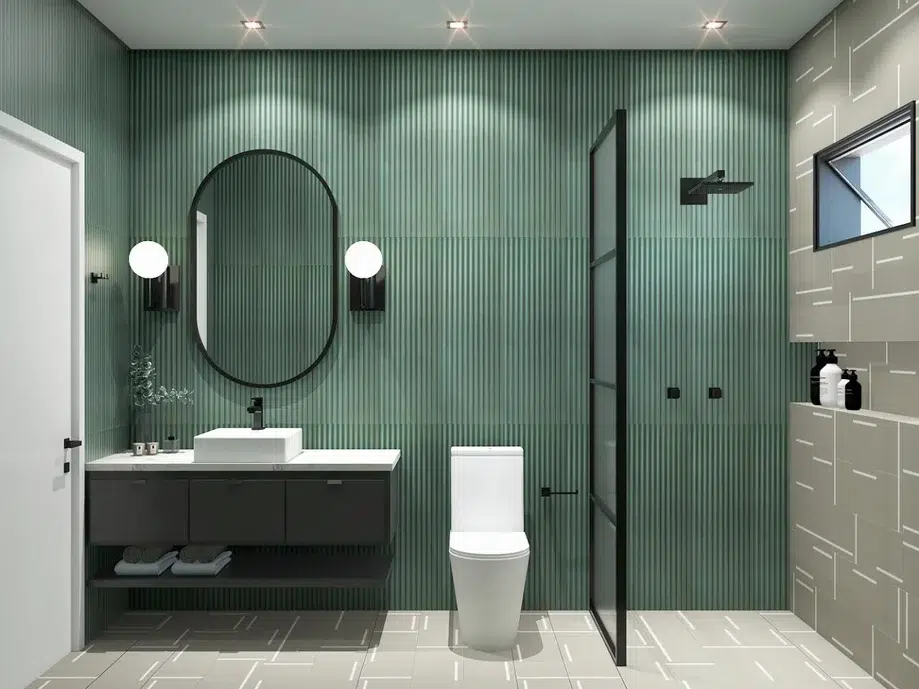 Banheiro com espelho oval, parede azul turquesa e detalhes preto