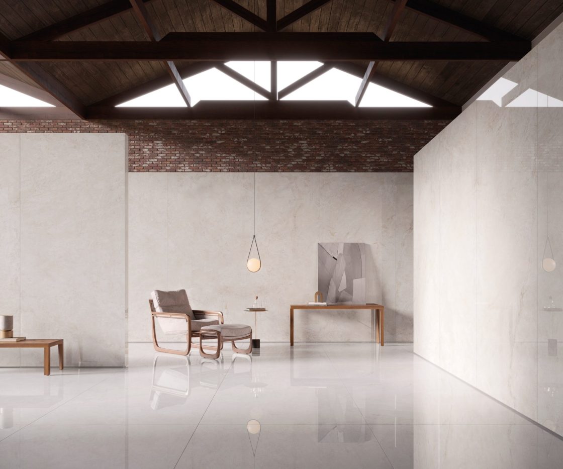 Sala ampla e minimalista com detalhes em estilo industrial