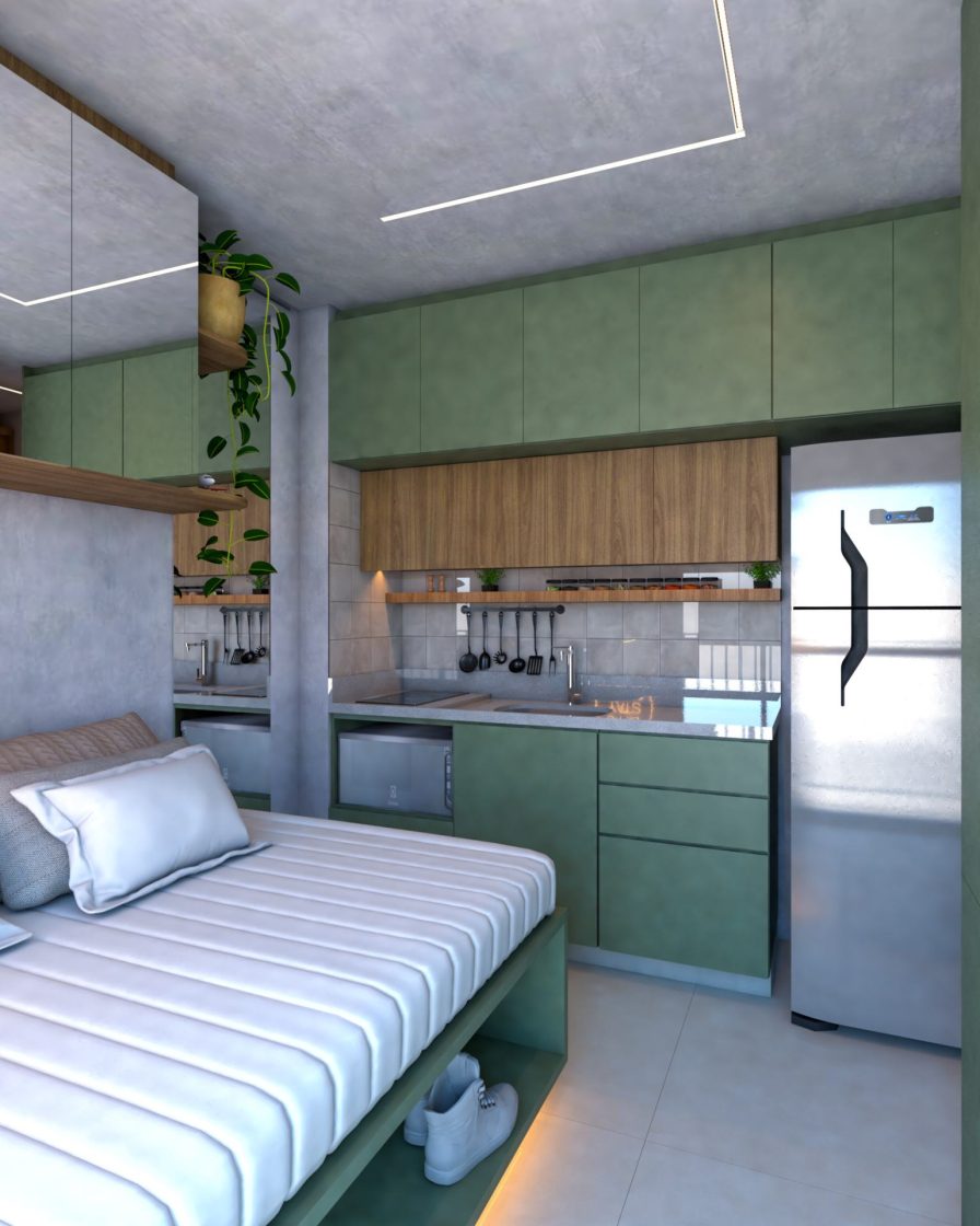 Studio com pequena cozinha com armários verdes