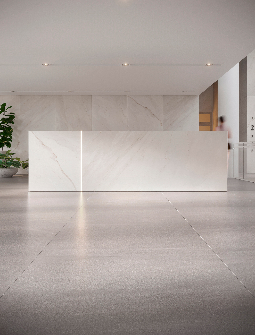 Bancada de porcelanato que recria mármore branco em recepção de ambiente comercial clean