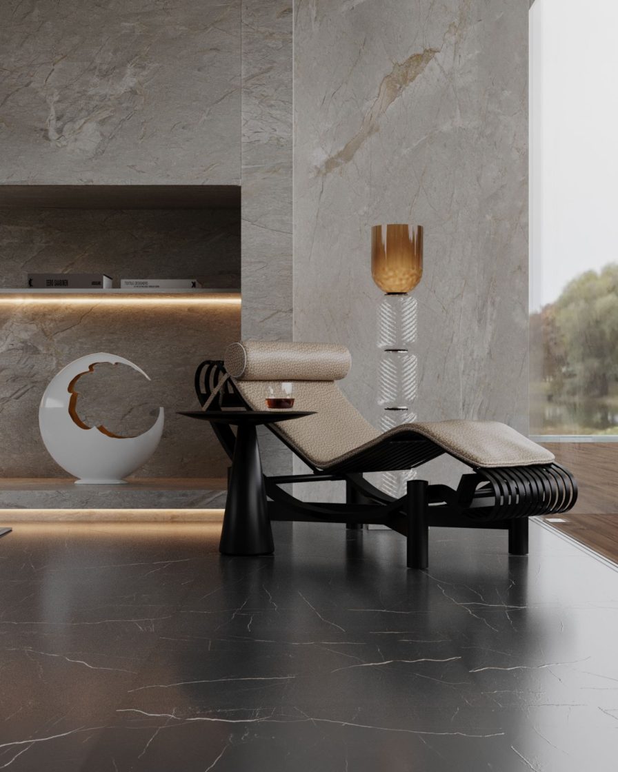 Living com piso que reproduz mármore preto e destaque para poltrona com design diferenciado, com estrutura preta e estofado bege